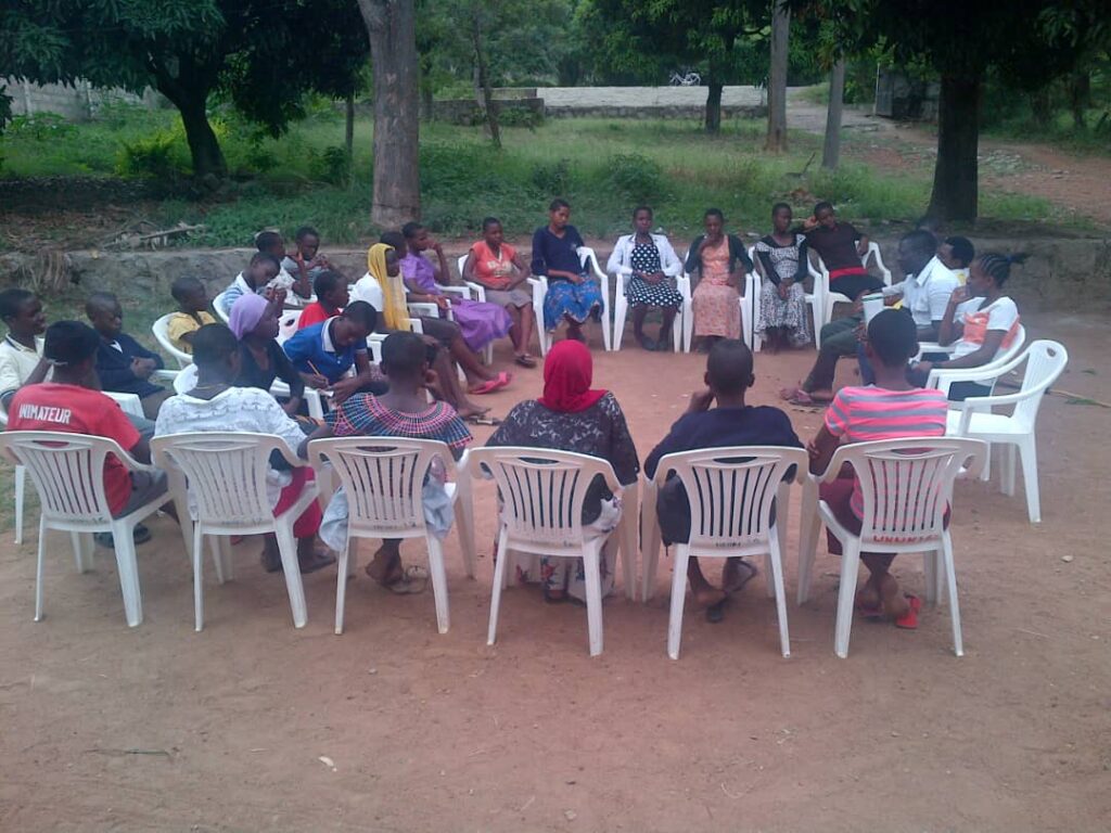 Photograph of a meeting between parents.