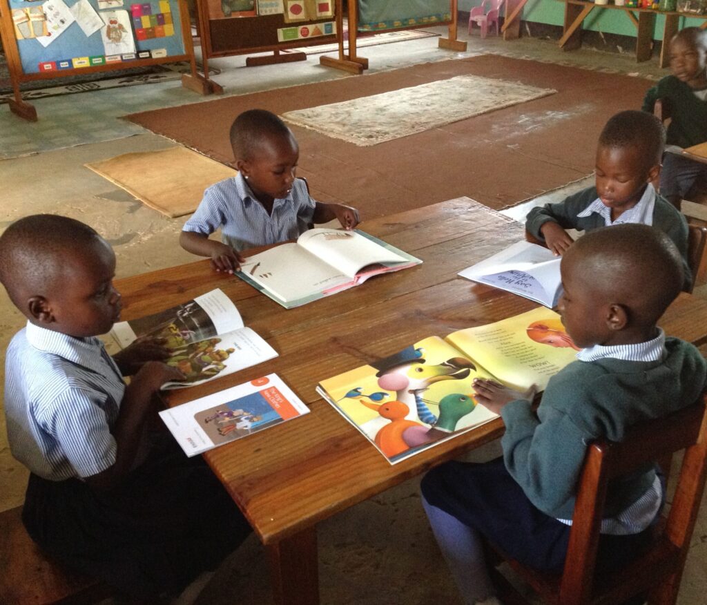 Children reading story books.